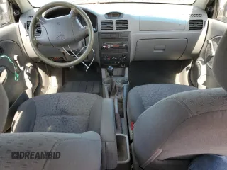 2004 Kia Rio with VIN KNADC125946330310, listed as a Copart auction lot 69411894 with 198,704 mi miles and Salvage Title. Bid and sale history available at DreamBid. Image 8.