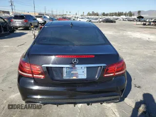 2017 Mercedes-Benz E-Class E 400 with VIN WDDKJ6FB0HF356545, listed as a Copart auction lot 84530444 with 76,367 mi miles and Salvage Title. Bid and sale history available at carsss.com. Image 6.