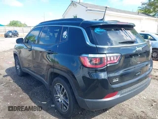 2020 Jeep Compass Latitude with VIN 3C4NJCBBXLT166004, listed as a IAAI auction lot 42025390 with 106,271 mi miles and . Bid and sale history available at carsss.com. Image 3.