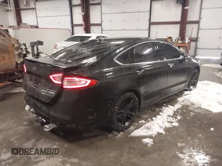 2014 Ford Fusion Titanium with VIN 3FA6P0K92ER336344, listed as a IAAI auction lot 41237225 with 178,169 mi miles. Bid and sale history available at carsss.com. Image 4.