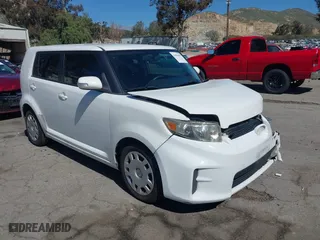 2011 Scion xB with VIN JTLZE4FE3B1138653, listed as a IAAI auction lot 41856599 with 349,174 mi miles. Bid and sale history available at carsss.com. Image 1.