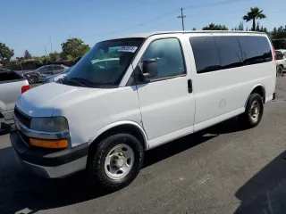 2013 Chevrolet Express Passenger 1LT z VIN 1GAZGYFG7D1130758, wystawiony jako Copart lot #59625915 z przebiegiem 152 806 mil mil oraz Szkoda całkowita • Salvage title. Historia ofert i sprzedaży dostępna na DreamBid. Obrazek 1.