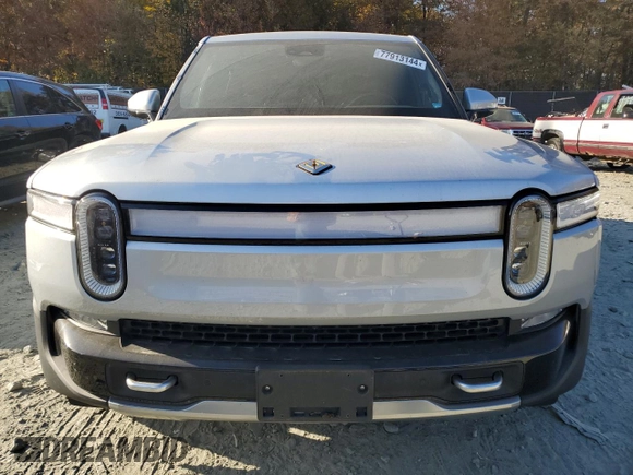 2022 Rivian R1T Launch Edition z VIN 7FCTGAAL6NN002704, wystawiony jako Copart lot #77913144 z przebiegiem 40 665 mil mil oraz Szkoda całkowita • Salvage title. Historia ofert i sprzedaży dostępna na DreamBid. Obrazek 5.