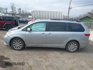 2015 Toyota Sienna Limited with VIN 5TDDK3DC6FS111465, listed as a IAAI auction lot 41698574 with 195,553 mi miles and . Bid and sale history available at DreamBid. Image 14.