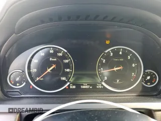 2014 BMW 7 Series 750i с VIN WBAYA8C57ED824970, выставлен на аукционе Copart как лот 61005925 с пробегом 144 457 миль миль и Чистый • Clean title. История ставок и продаж доступна на DreamBid. Изображение 9.