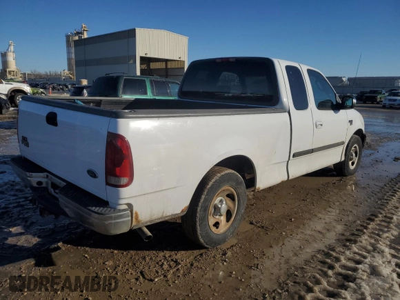 2002 Ford F-150 XL with VIN 1FTRX17L42KD35973, listed as a Copart auction lot 89121325 with 258,895 mi miles and Salvage title. Bid and sale history available at DreamBid. Image 3.