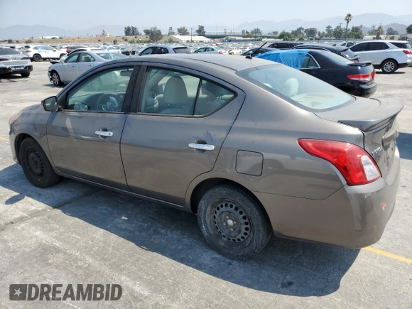 2016 Nissan Versa S with VIN 3N1CN7AP0GL803412, listed as a Copart auction lot 64677645 with 96,788 mi miles and Salvage title. Bid and sale history available at DreamBid. Image 2.