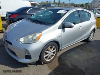 2013 Toyota Prius c One with VIN JTDKDTB3XD1534662, listed as a IAAI auction lot 41859938 with 136,151 mi miles. Bid and sale history available at carsss.com. Image 17.