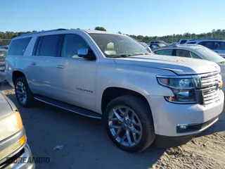 2019 Chevrolet Suburban Premier with VIN 1GNSCJKC0KR293658, listed as a IAAI auction lot 40563834 with 153,619 mi miles. Bid and sale history available at carsss.com. Image 13.