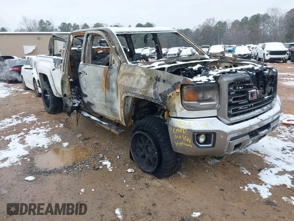 2015 GMC Sierra 2500HD SLT z VIN 1GT12ZE85FF604070, wystawiony jako IAAI lot #41617860 z przebiegiem Nie podano mil oraz . Historia ofert i sprzedaży dostępna na DreamBid. Obrazek 1.