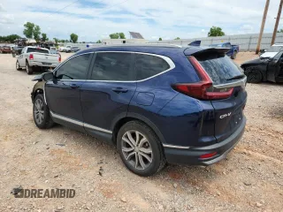 2020 Honda CR-V Touring с VIN 2HKRW2H9XLH631074, выставлен на аукционе Copart как лот 62957255 с пробегом 21 460 миль миль и Списание • Salvage title. История ставок и продаж доступна на DreamBid. Изображение 2.