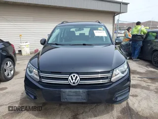 2018 Volkswagen Tiguan with VIN WVGBV7AX3JK002325, listed as a IAAI auction lot 41960059 with 57,619 mi miles and . Bid and sale history available at DreamBid. Image 12.