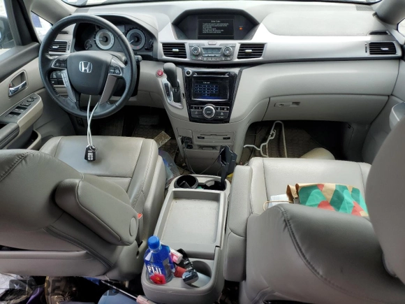 2015 Honda Odyssey EX-L with VIN 5FNRL5H64FB089909, listed as a Copart auction lot 53192035 with 174,909 mi miles and Salvage Title. Bid and sale history available at DreamBid. Image 8.