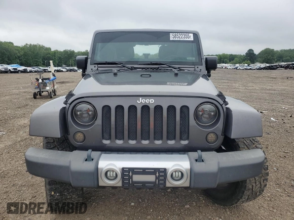 2014 Jeep Wrangler Unlimited Sahara with VIN 1C4HJWEG7EL299548, listed as a Copart auction lot 58522355 with 76,057 mi miles and Clean title. Bid and sale history available at DreamBid. Image 5.