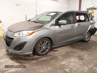 2012 Mazda 5 Sport z VIN JM1CW2BL1C0115371, wystawiony jako IAAI lot #42134834 z przebiegiem 138 840 mil mil oraz . Historia ofert i sprzedaży dostępna na DreamBid. Obrazek 21.