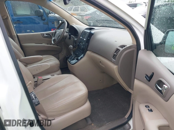 2012 Kia Sedona EX with VIN KNDMH4C76C6457908, listed as a IAAI auction lot 42179927 with 196,104 mi miles and . Bid and sale history available at DreamBid. Image 5.