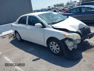 2009 Toyota Corolla with VIN JTDBL40E599087258, listed as a IAAI auction lot 41985357 with 168,115 mi miles. Bid and sale history available at carsss.com. Image 1.
