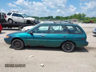 1997 Ford Escort LX with VIN 3FALP15P5VR126145, listed as a IAAI auction lot 42637921 with 148,109 mi miles and . Bid and sale history available at DreamBid. Image 14.