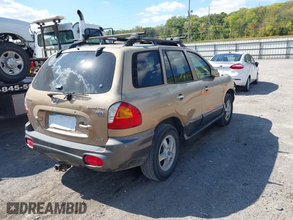 2004 Hyundai Santa Fe GLS z VIN KM8SC73EX4U814067, wystawiony jako IAAI lot #40404373 z przebiegiem 182 101 mil mil oraz . Historia ofert i sprzedaży dostępna na DreamBid. Obrazek 4.
