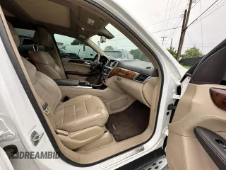 2014 Mercedes-Benz M 550 z VIN 4JGDA7DB0EA386032, wystawiony jako Copart lot #61507465 z przebiegiem 131 078 mil mil oraz Czysty tytuł • Clean title. Historia ofert i sprzedaży dostępna na DreamBid. Obrazek 5.