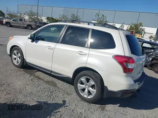 2014 Subaru Forester Premium with VIN JF2SJAEC1EH447400, listed as a IAAI auction lot 42532127 with 128,173 mi miles and . Bid and sale history available at DreamBid. Image 3.