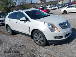 2011 Cadillac SRX Performance Collection with VIN 3GYFNEEYXBS559777, listed as a IAAI auction lot 41901651 with 177,662 mi miles. Bid and sale history available at carsss.com. Image 1.