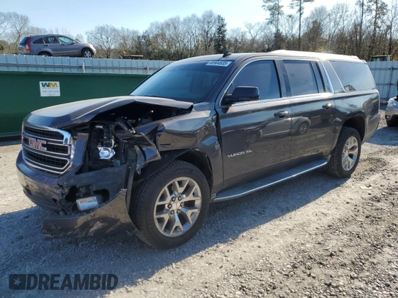 2015 GMC Yukon XL SLT with VIN 1GKS1HKC3FR188825, listed as a Copart auction lot 88904935 with 201,178 mi miles and Salvage Title. Bid and sale history available at carsss.com. Image 1.