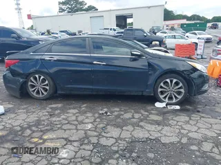 2013 Hyundai Sonata SE z VIN 5NPEC4AB6DH671007, wystawiony jako IAAI lot #42372573 z przebiegiem 149 030 mil mil oraz . Historia ofert i sprzedaży dostępna na DreamBid. Obrazek 12.