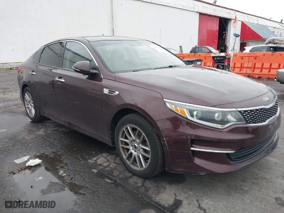 2016 Kia Optima EX with VIN 5XXGU4L31GG004714, listed as a IAAI auction lot 41183230 with 108,084 mi miles. Bid and sale history available at carsss.com. Image 1.