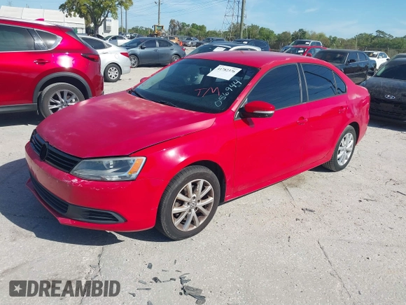 2011 Volkswagen Jetta SE z VIN 3VWDX7AJ1BM056944, wystawiony jako IAAI lot #41782376 z przebiegiem 127 336 mil mil oraz . Historia ofert i sprzedaży dostępna na DreamBid. Obrazek 2.