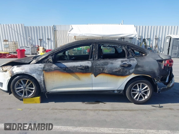 2017 Ford Focus SE with VIN 1FADP3F25HL221763, listed as a IAAI auction lot 41995746 with 101,369 mi miles and . Bid and sale history available at DreamBid. Image 14.