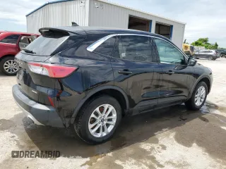 2021 Ford Escape SE with VIN 1FMCU9G60MUA42856, listed as a Copart auction lot 61759735 with 121,059 mi miles and Clean title. Bid and sale history available at DreamBid. Image 3.