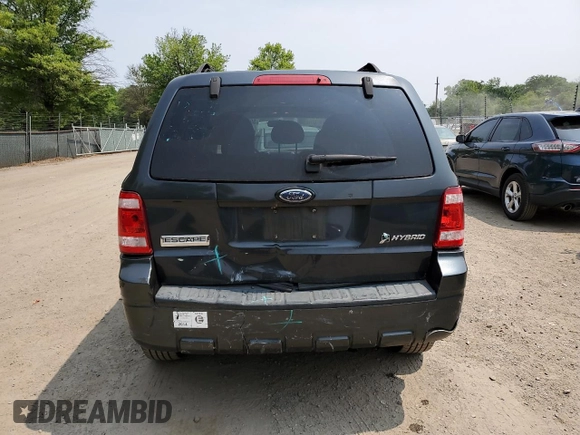2008 Ford Escape Hybrid z VIN 1FMCU49H38KA03178, wystawiony jako Copart lot #59577115 z przebiegiem 223 992 mil mil oraz Szkoda całkowita • Salvage title. Historia ofert i sprzedaży dostępna na DreamBid. Obrazek 6.