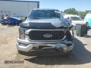 2023 Ford F-150 XL with VIN 1FTFW1E55PKF18784, listed as a Copart auction lot 52807315 with 15,284 mi miles and Salvage Title. Bid and sale history available at carsss.com. Image 5.