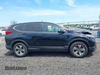 2019 Honda CR-V LX z VIN 2HKRW6H31KH208188, wystawiony jako IAAI lot #42235856 z przebiegiem 140 067 mil mil oraz . Historia ofert i sprzedaży dostępna na DreamBid. Obrazek 13.