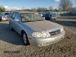 2005 Kia Optima LX z VIN KNAGD128155423463, wystawiony jako Copart lot #87441284 z przebiegiem 143 193 mil mil oraz Szkoda całkowita • Salvage title. Historia ofert i sprzedaży dostępna na DreamBid. Obrazek 11.