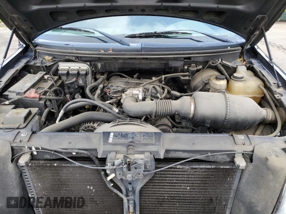 2007 Ford F-150 XL with VIN 1FTRF12297KD65656, listed as a Copart auction lot 59764355 with 97,702 mi miles and Salvage title. Bid and sale history available at DreamBid. Image 11.
