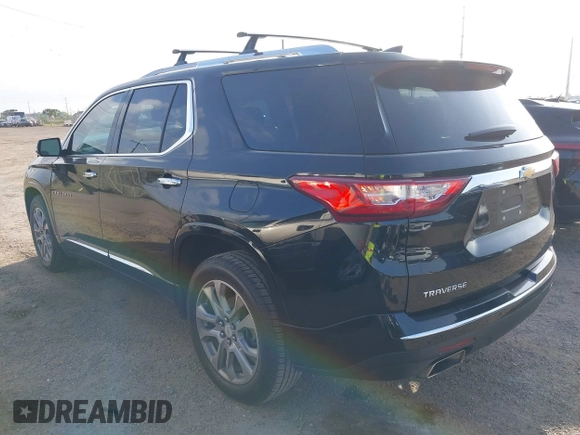 2018 Chevrolet Traverse Premier with VIN 1GNERKKW3JJ157873, listed as a IAAI auction lot 42448292 with 78,077 mi miles and . Bid and sale history available at DreamBid. Image 14.