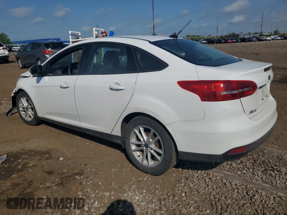 2017 Ford Focus SE with VIN 1FADP3F26HL313478, listed as a Copart auction lot 57078015 with 56,807 mi miles and Salvage title. Bid and sale history available at DreamBid. Image 2.
