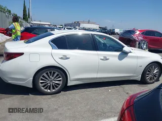 2019 Infiniti Q50 Luxe z VIN JN1EV7AP7KM518276, wystawiony jako IAAI lot #42148033 z przebiegiem 56 720 mil mil oraz . Historia ofert i sprzedaży dostępna na DreamBid. Obrazek 13.