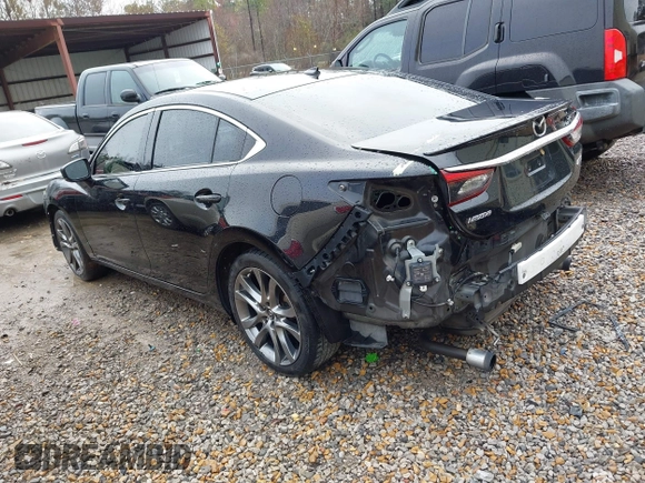2017 Mazda 6 Grand Touring with VIN JM1GL1X54H1131788, listed as a IAAI auction lot 41640785 with 181,561 mi miles. Bid and sale history available at carsss.com. Image 3.