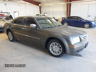 2010 Chrysler 300 Touring with VIN 2C3CA5CV4AH212822, listed as a IAAI auction lot 42178332 with 245,619 mi miles. Bid and sale history available at carsss.com. Image 1.