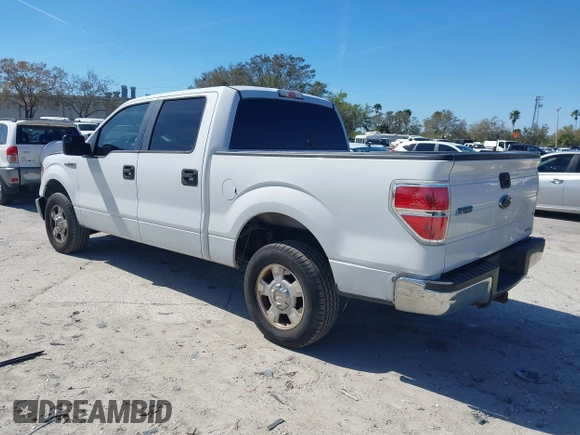 2012 Ford F-150 XL with VIN 1FTEW1CM2CFC06897, listed as a IAAI auction lot 41641309 with 123,853 mi miles. Bid and sale history available at carsss.com. Image 3.