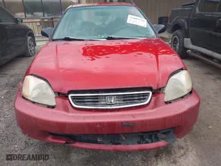 1997 Honda Civic LX "O" w/Air with VIN 1HGEJ6672VL019621, listed as a IAAI auction lot 42081226 with 194,957 mi miles. Bid and sale history available at carsss.com. Image 6.