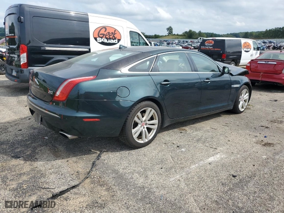 2014 Jaguar XJ with VIN SAJWJ2GD4E8V70170, listed as a Copart auction lot 69662054 with 121,188 mi miles and Non Repairable. Bid and sale history available at carsss.com. Image 3.