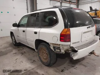 2004 GMC Envoy SLE with VIN 1GKDT13S042173138, listed as a IAAI auction lot 41340595 with 111,282 mi miles. Bid and sale history available at carsss.com. Image 3.