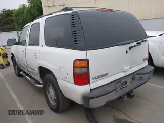 2002 GMC Yukon SLT with VIN 1GKEC13T02R313772, listed as a IAAI auction lot 42131289 with 215,164 mi miles. Bid and sale history available at carsss.com. Image 3.