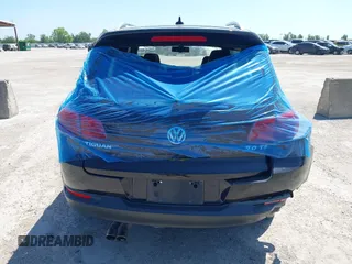 2014 Volkswagen Tiguan SEL with VIN WVGAV3AX4EW025339, listed as a IAAI auction lot 42313665 with 96,756 mi miles and . Bid and sale history available at DreamBid. Image 16.