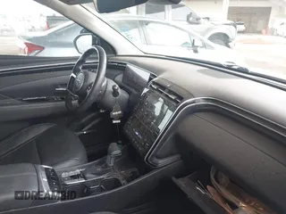 2022 Hyundai Tucson SEL with VIN 5NMJC3AE6NH060475, listed as a IAAI auction lot 41808281 with 94,694 mi miles and . Bid and sale history available at DreamBid. Image 5.