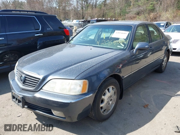 2004 Acura RL w/Navigation System with VIN JH4KA96634C006366, listed as a IAAI auction lot 42054689 with 350,809 mi miles. Bid and sale history available at carsss.com. Image 2.